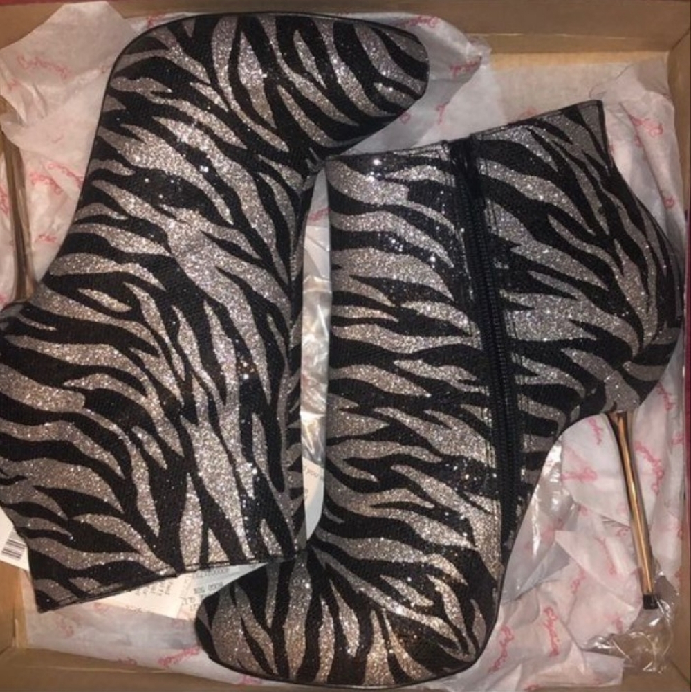 Zebra print heeled boots